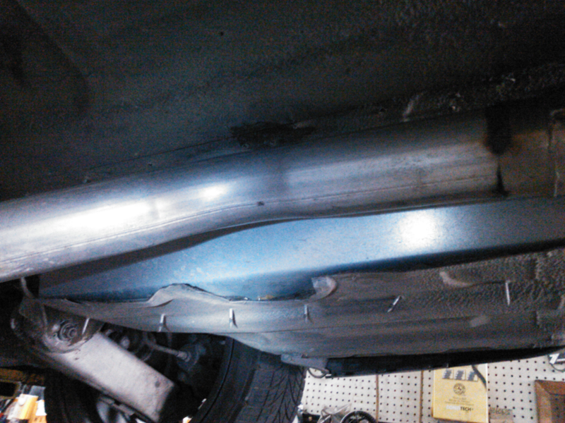Illustration for article titled When you really, truly have to have a center exhaust on your E39